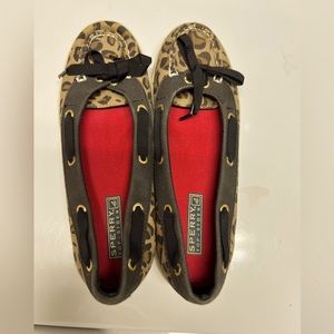 Gently worn animal print slip on Sperry shoes